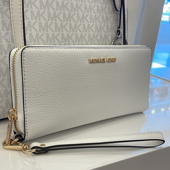 Michael Kors Handbags - MICHAEL KORS
Leather Continental Wristlet Phone Case Wallet 
Optic White
NWT
